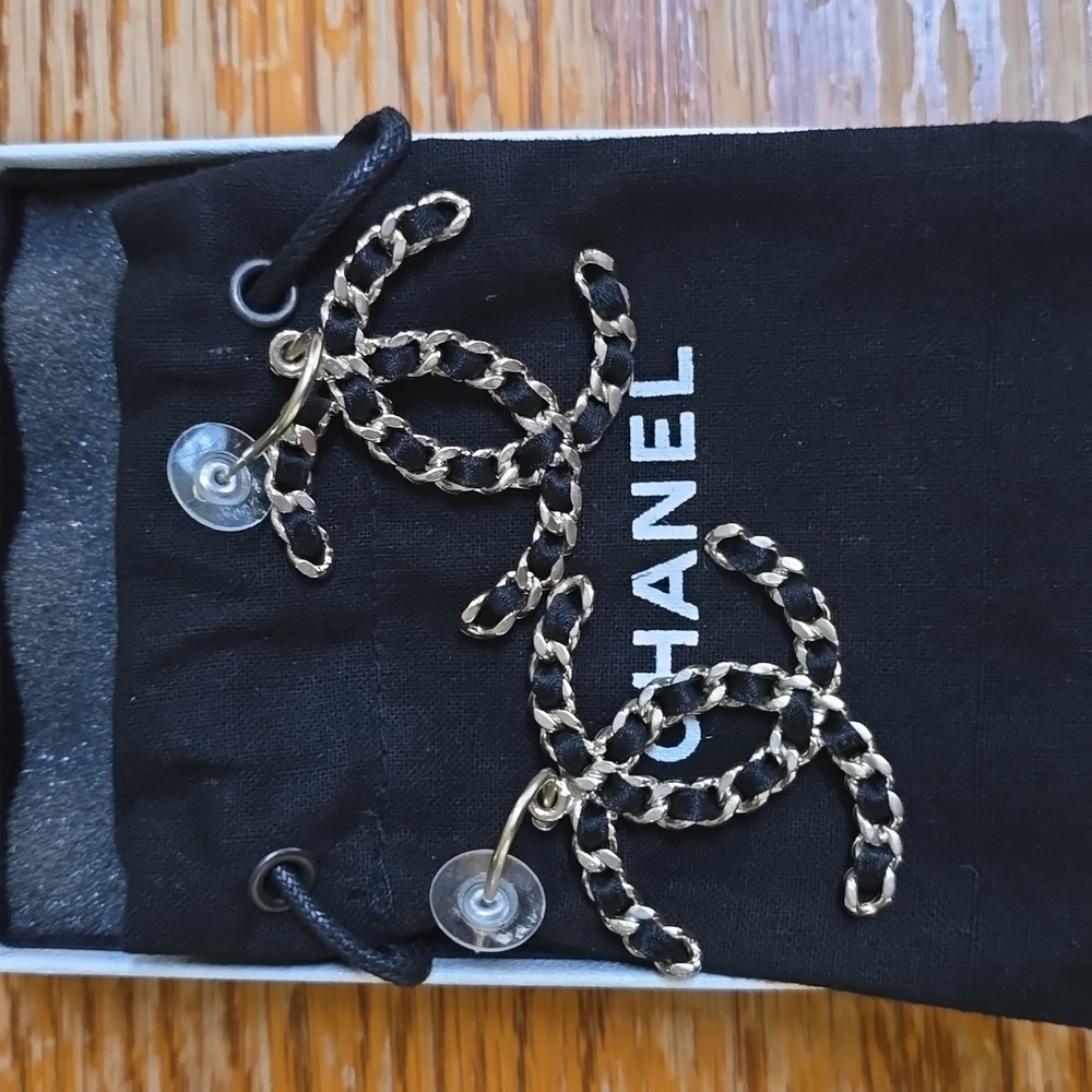 A beautiful pair of CHANEL chain dangle CC earrings!